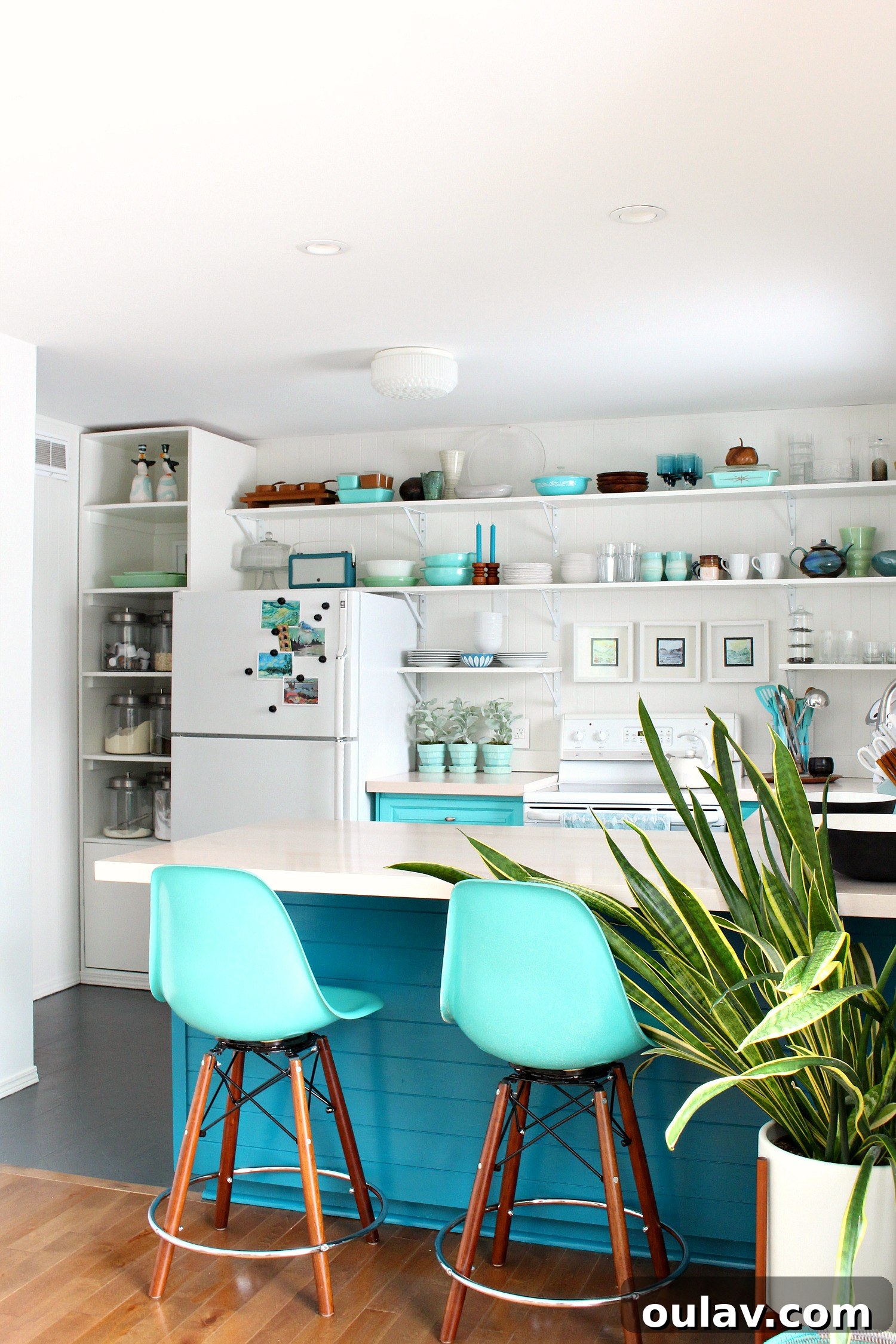 Transform Your Kitchen Cabinets Tongue and Groove Paneling and a Fresh Teal Hue 8 How to Install Tongue and Groove Paneling on Kitchen Cabinets for a Modern Teal Kitchen