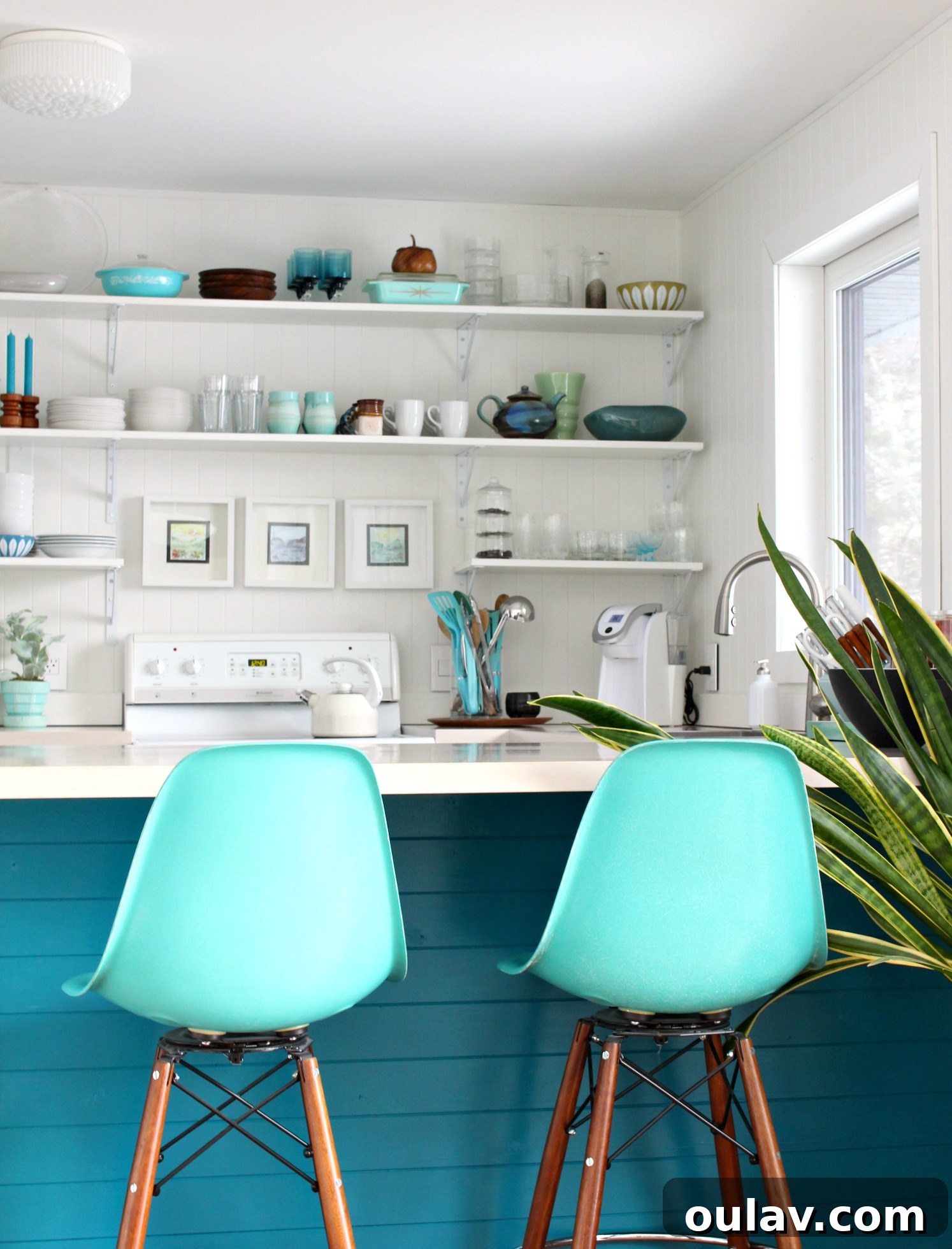 Transform Your Kitchen Cabinets Tongue and Groove Paneling and a Fresh Teal Hue 9 Modern Paneling Idea: Incorporating Wood Paneling into Kitchen Cabinet Design