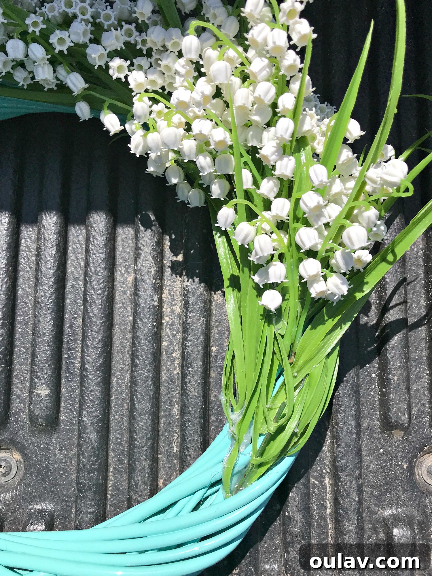 Effortless Turquoise Lily Faux Wreath 12 Various sized clusters of faux flowers, prepared for hot gluing onto the wreath