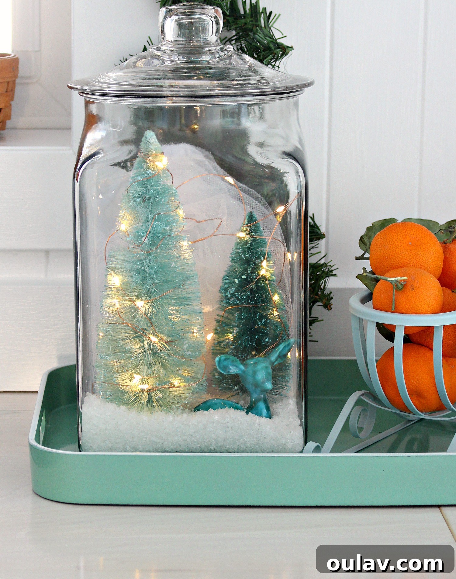 Arranging Miniatures in a Glass Jar for Winter Decor