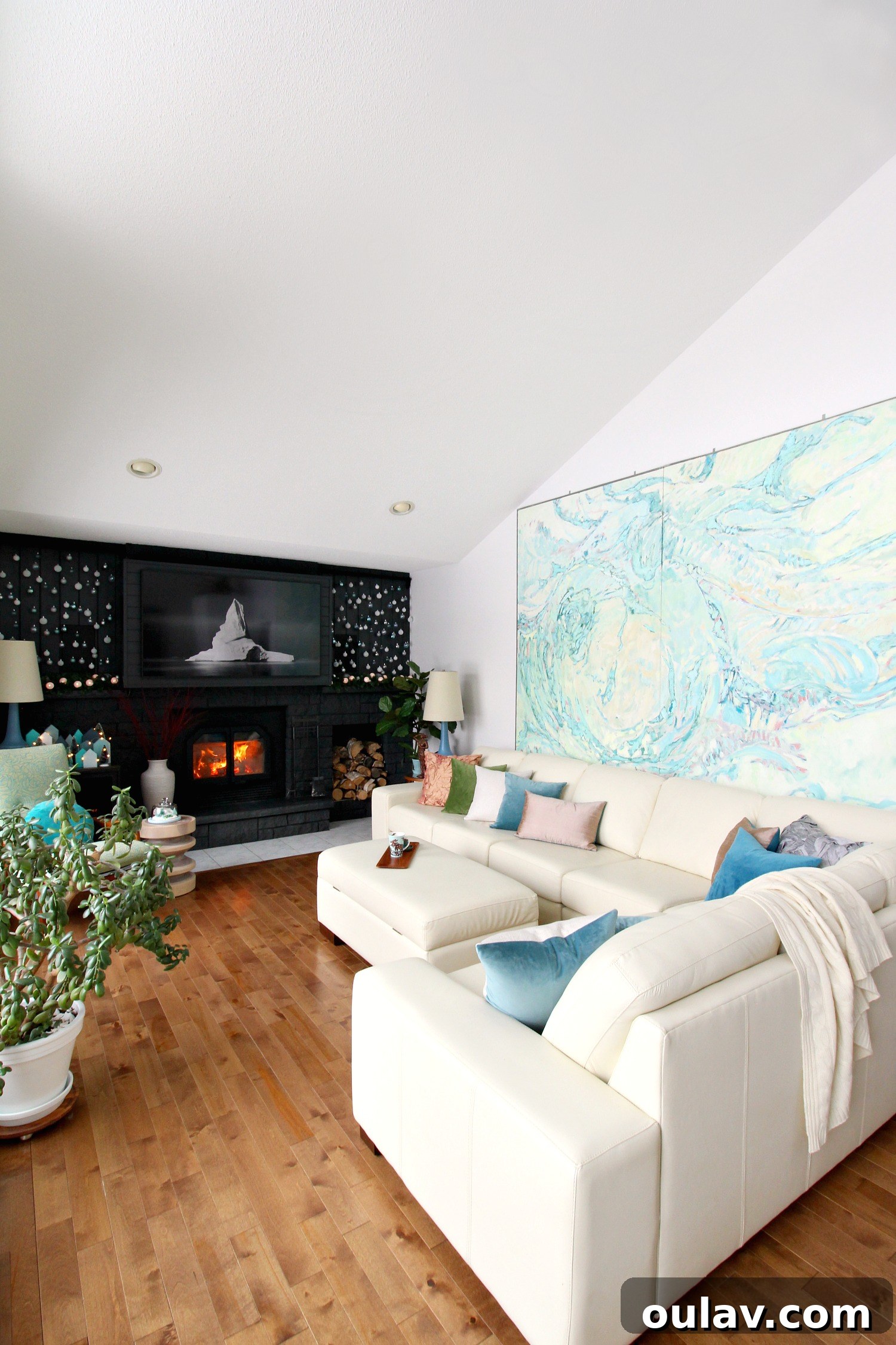 19 Top Picks from Dans le Lakehouse 2019 20 Elegant cascading ornaments hanging beside a TV for holiday decor