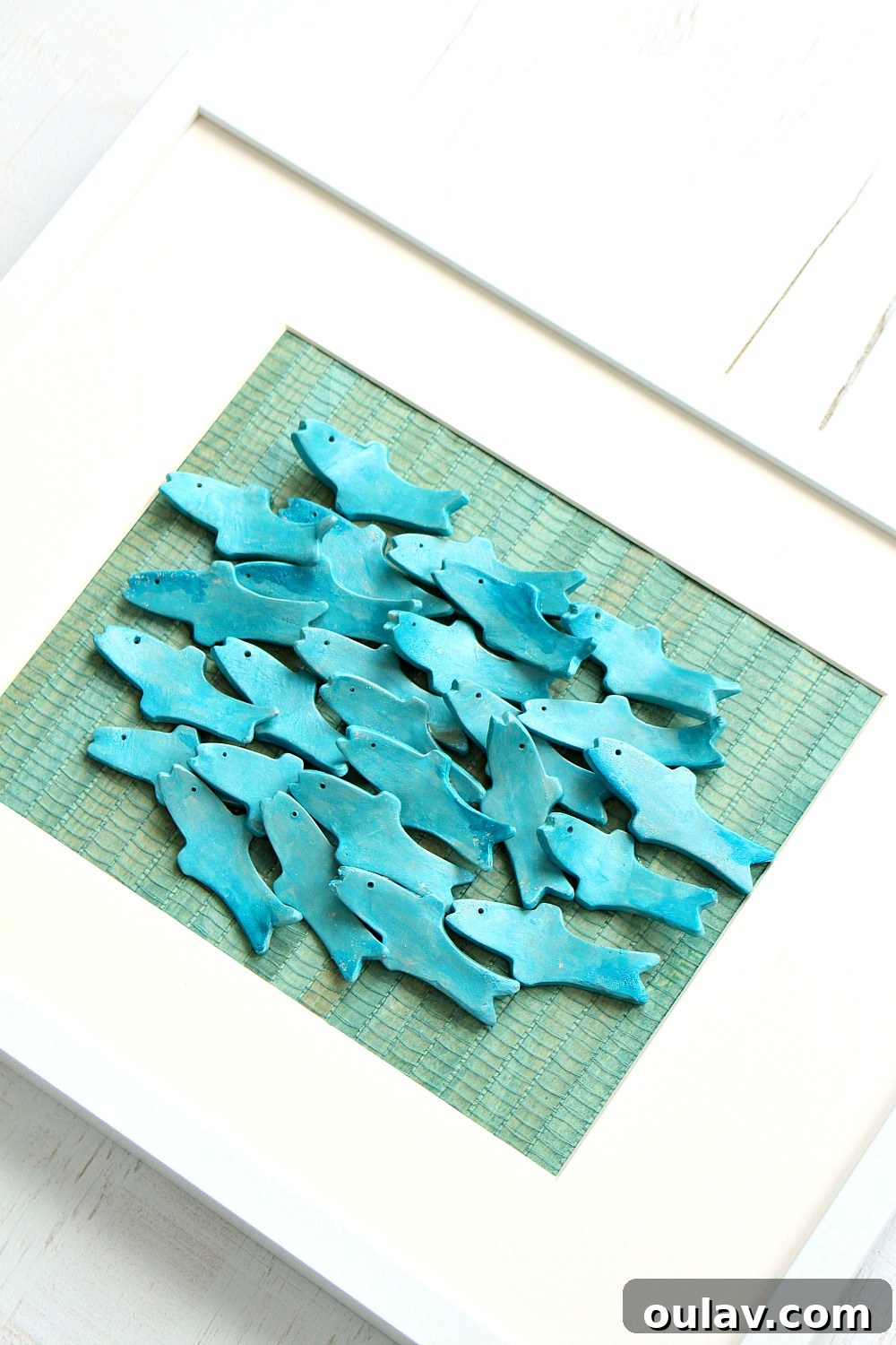15+ Fun & Easy Crafts to Keep Kids Busy While Schools Are Out 6 DIY air dry clay fish sculptural art for kids' creative expression