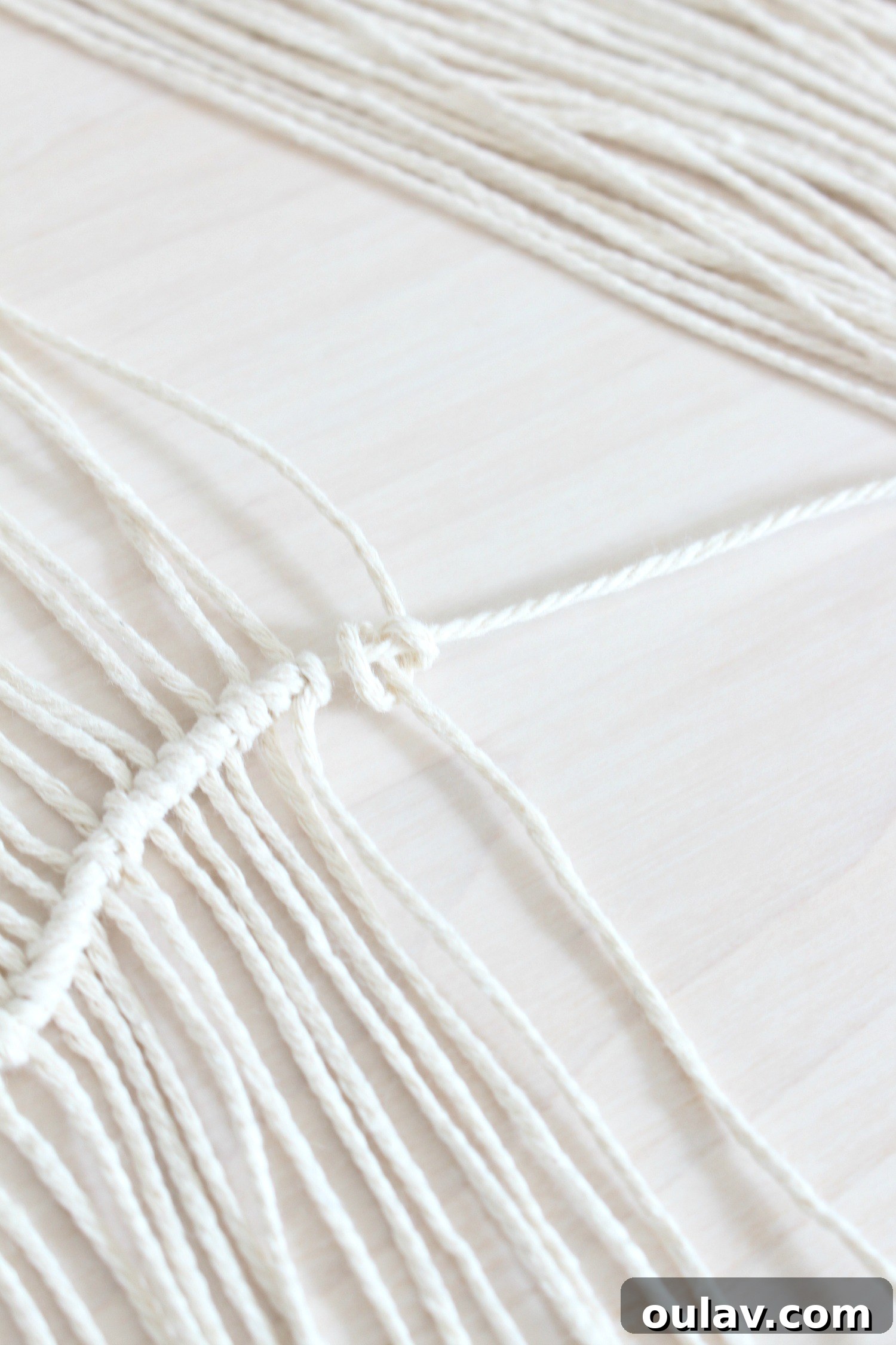 Handcraft Your Own Macrame Driftwood Wall Art 19 Three photos demonstrating the completed clove hitch knot, showing the tight knot and how it looks in sequence.