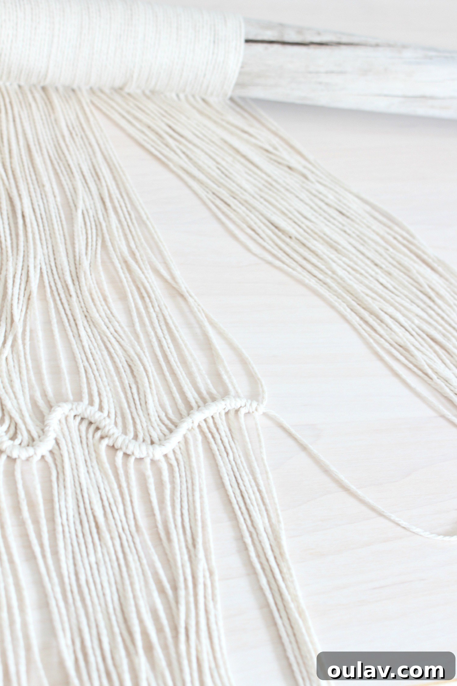 Handcraft Your Own Macrame Driftwood Wall Art 23 A detailed image showing the gradual rise and fall of the knots, creating the wave effect.