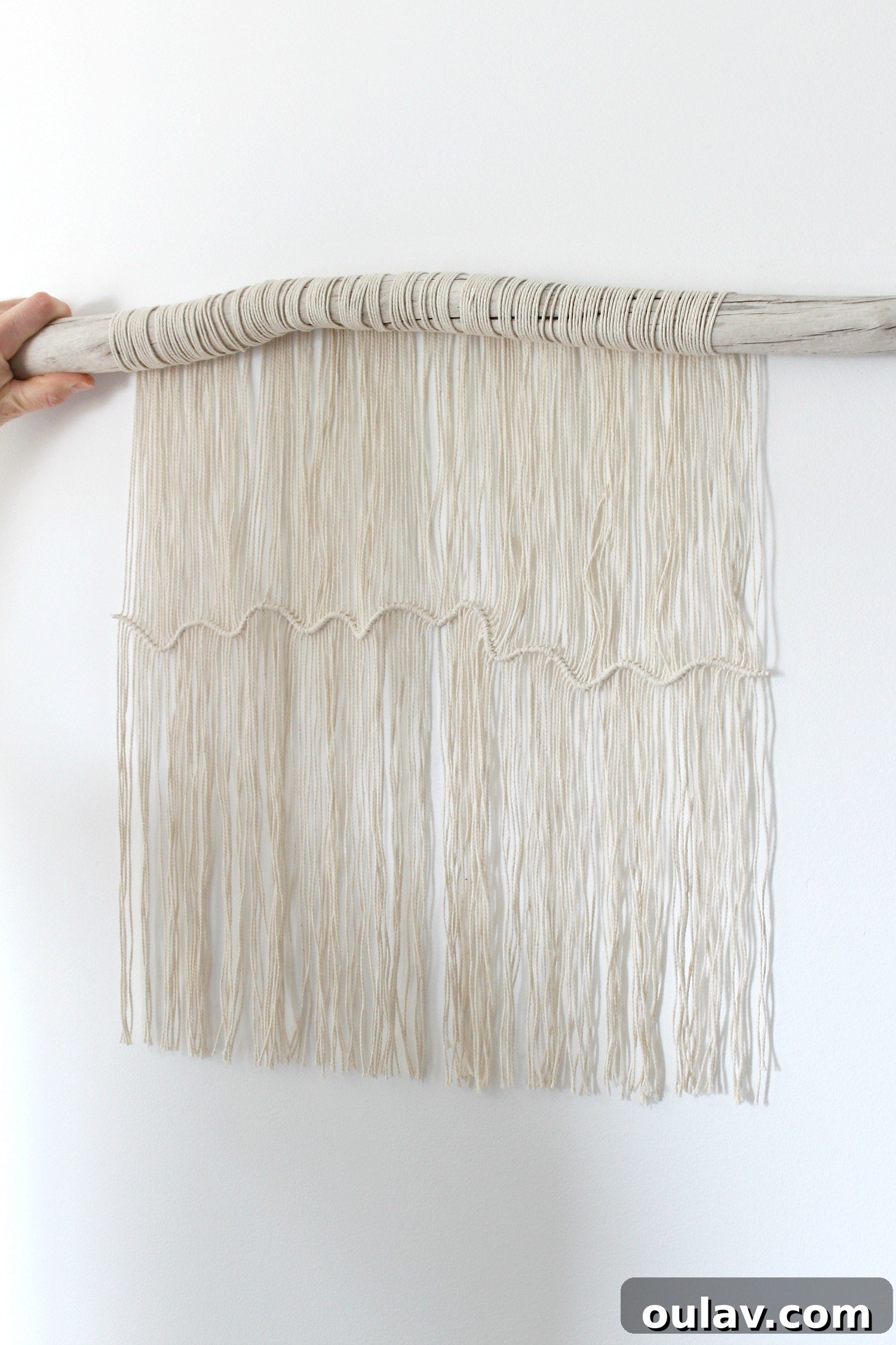 Handcraft Your Own Macrame Driftwood Wall Art 25 The completed macrame wall hanging, demonstrating the overall effect before dip-dyeing and final trimming.
