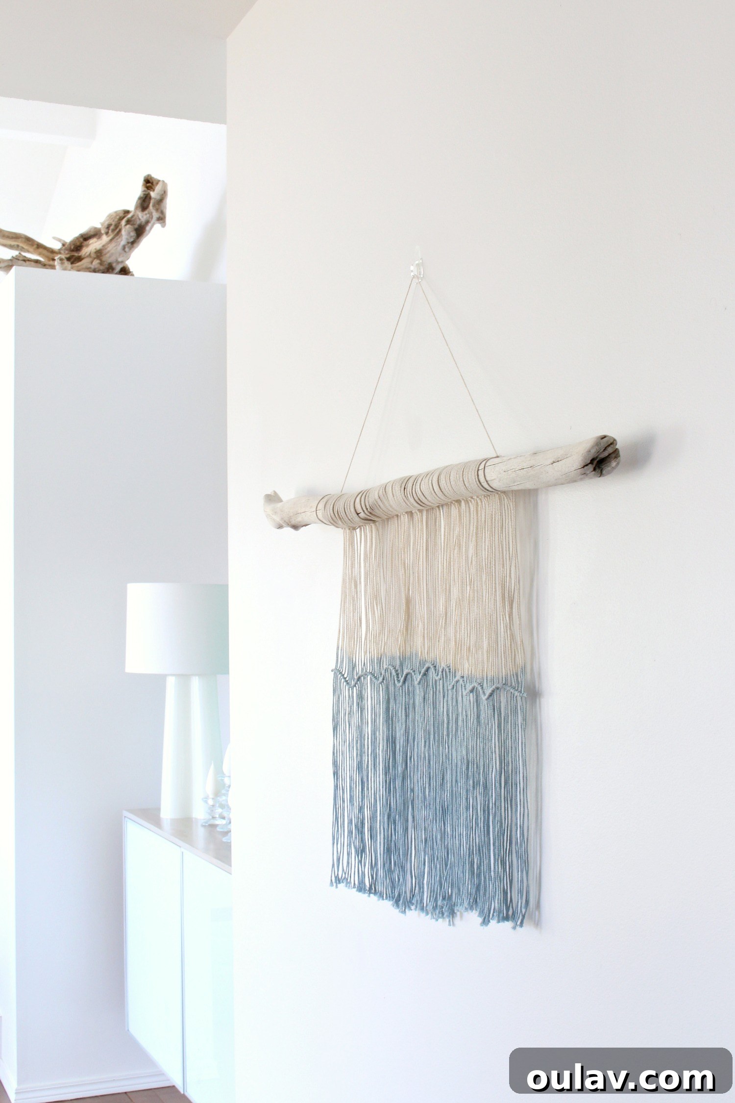 Handcraft Your Own Macrame Driftwood Wall Art 8 Another perspective of the finished macrame art, emphasizing its light and airy feel.