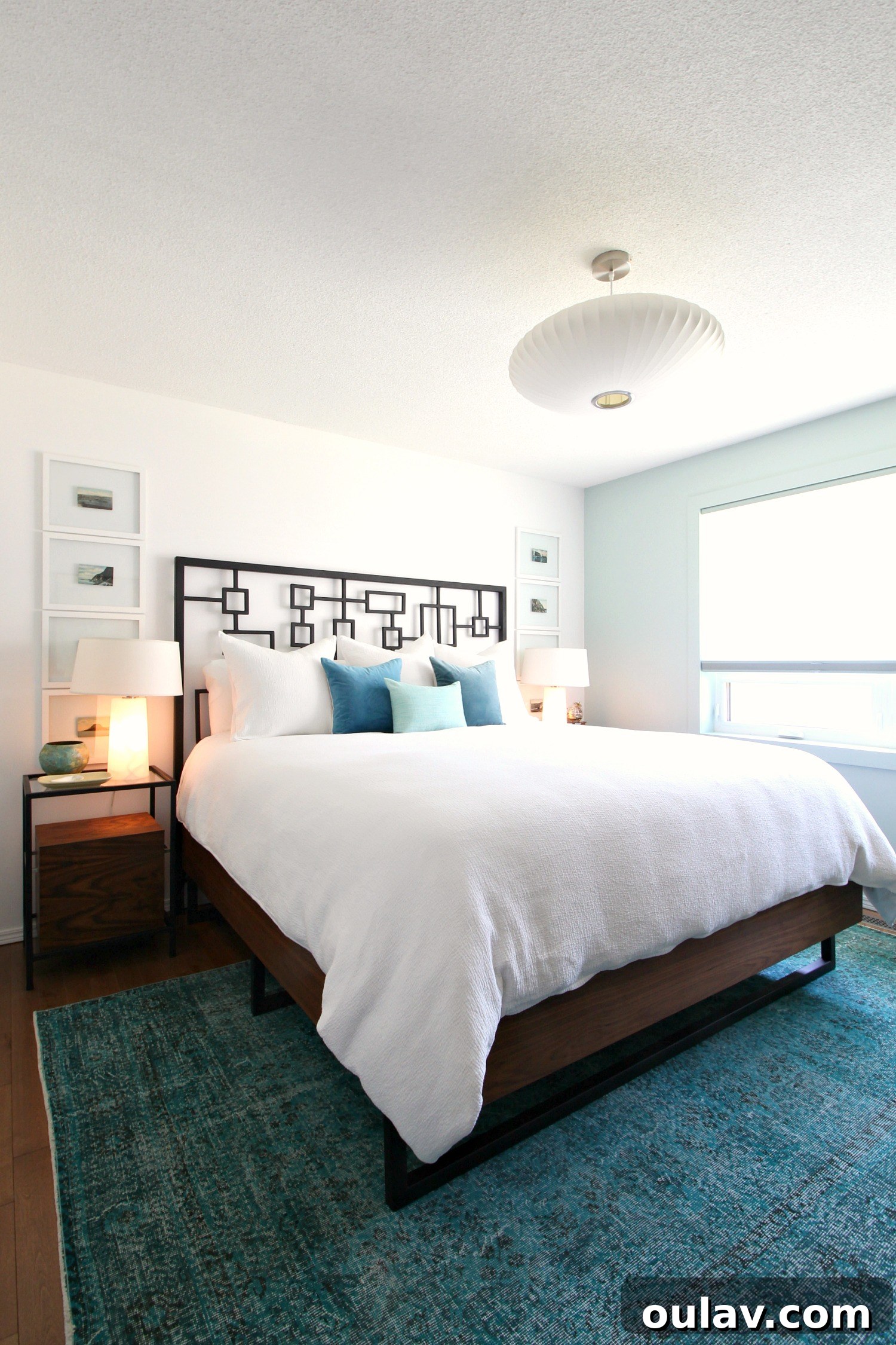A Summer Dream Inside Our Lake House Oasis 32 Bedroom with Cheery Teal Rug and Lake View